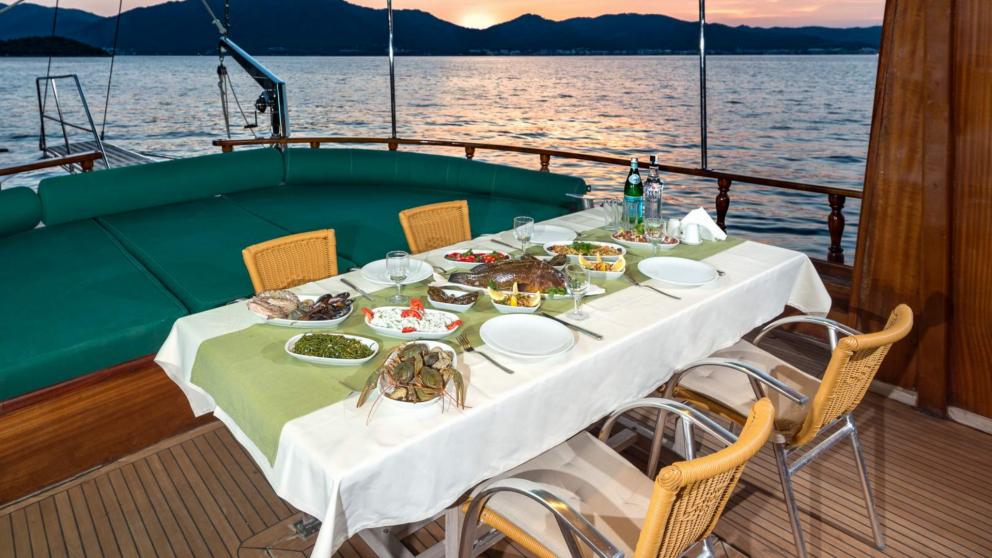Dinner on a yacht during sunset